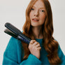 Woman holding Cloud Nine Contouring Wide Iron 